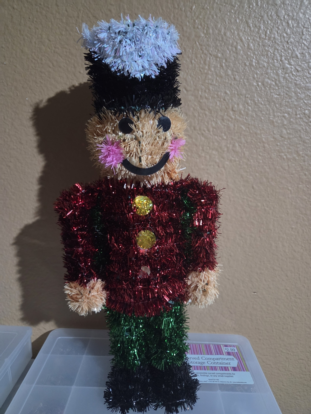 Festive Tinsel Nutcracker Decoration - Red, Green, Black